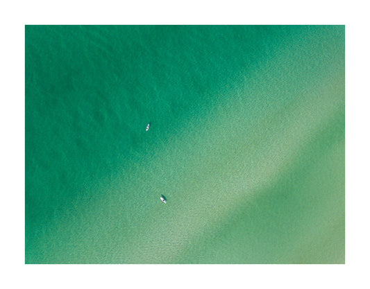 Paddle boarders from drone